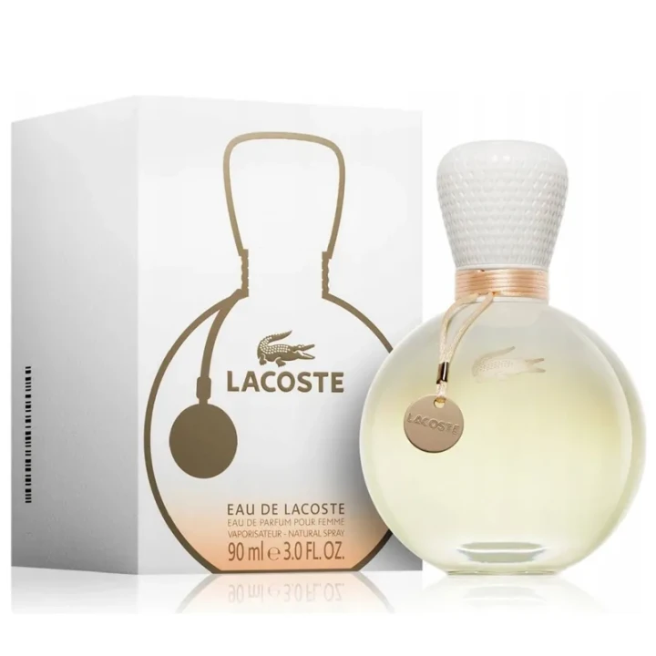 Lacoste Eau de Lacoste – oryginalne perfumy damskie w eleganckim, mleczno-białym okrągłym flakonie ze złotymi detalami – zdjęcie produktu